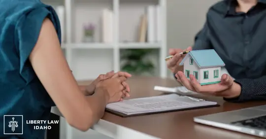 property transaction, with agent holding a house model.
