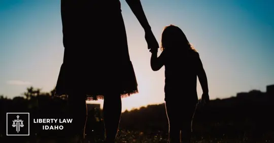 silhouette of mother and child